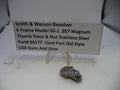 Smith & Wesson revolver part with descriptive card on a white background