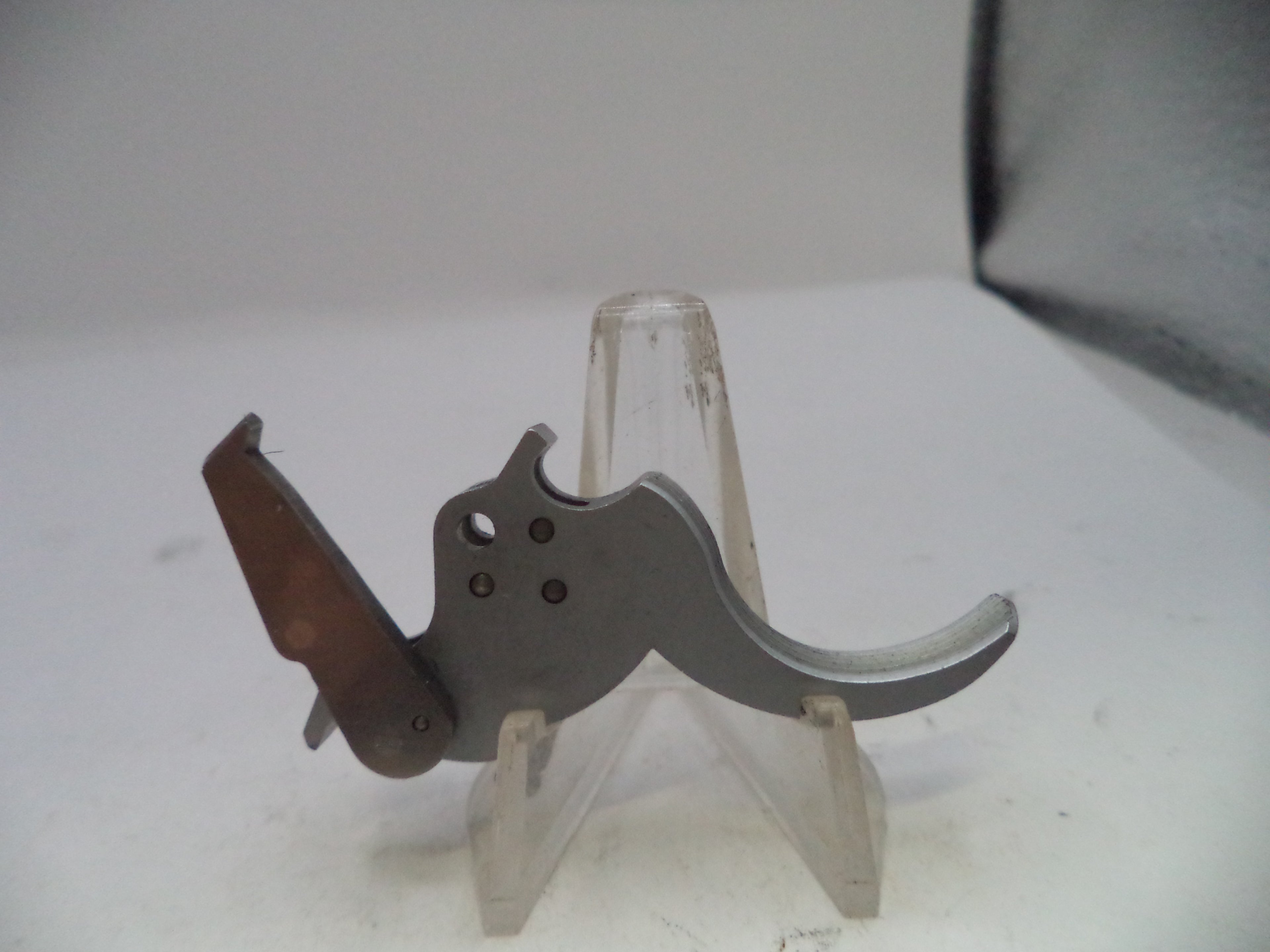 Mechanical component on a stand with a white background