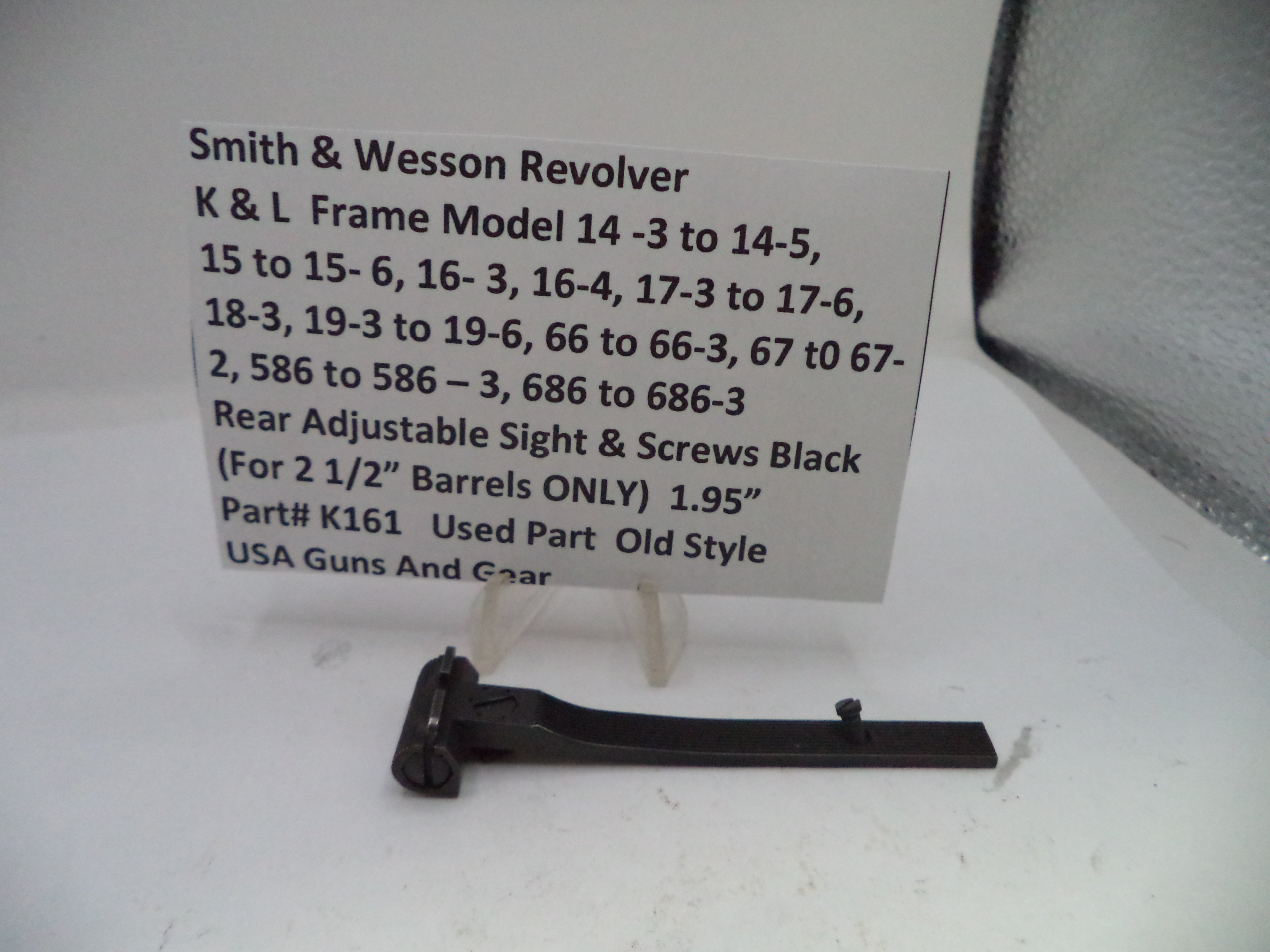 Smith & Wesson revolver part with specifications on a white background