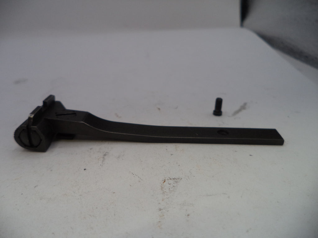 Black metal lever on a white surface