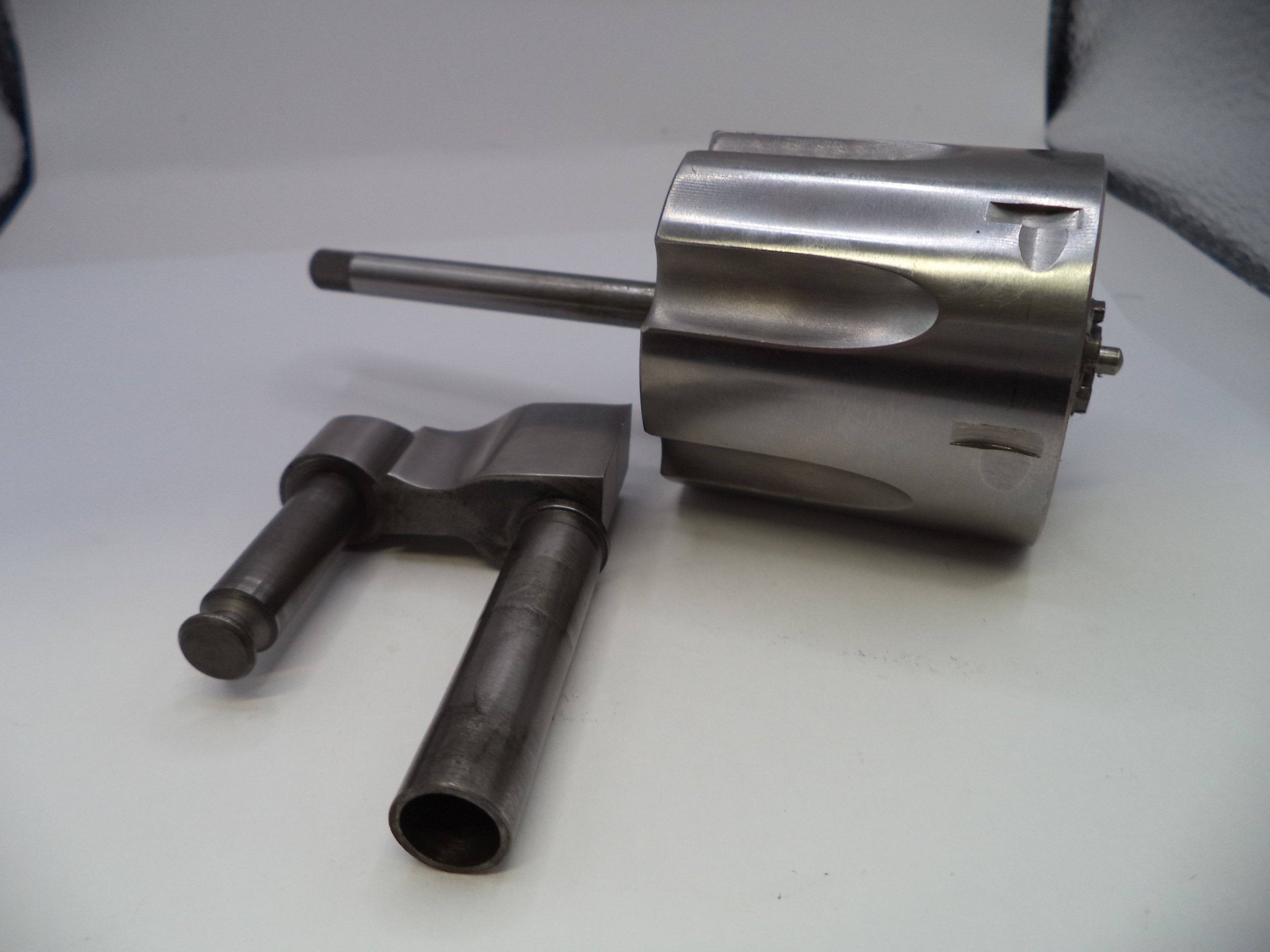 Metal components on a white surface