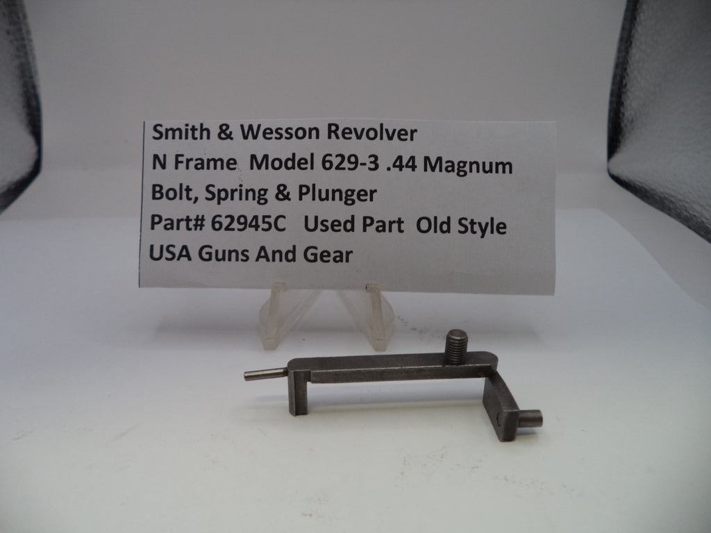 Smith & Wesson revolver part on a white background with a label