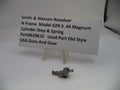 Smith & Wesson revolver part with a label on a white background