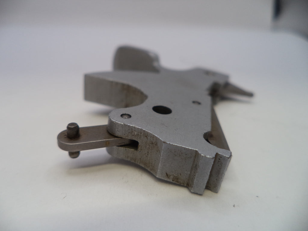 Metal tool or component on a white background