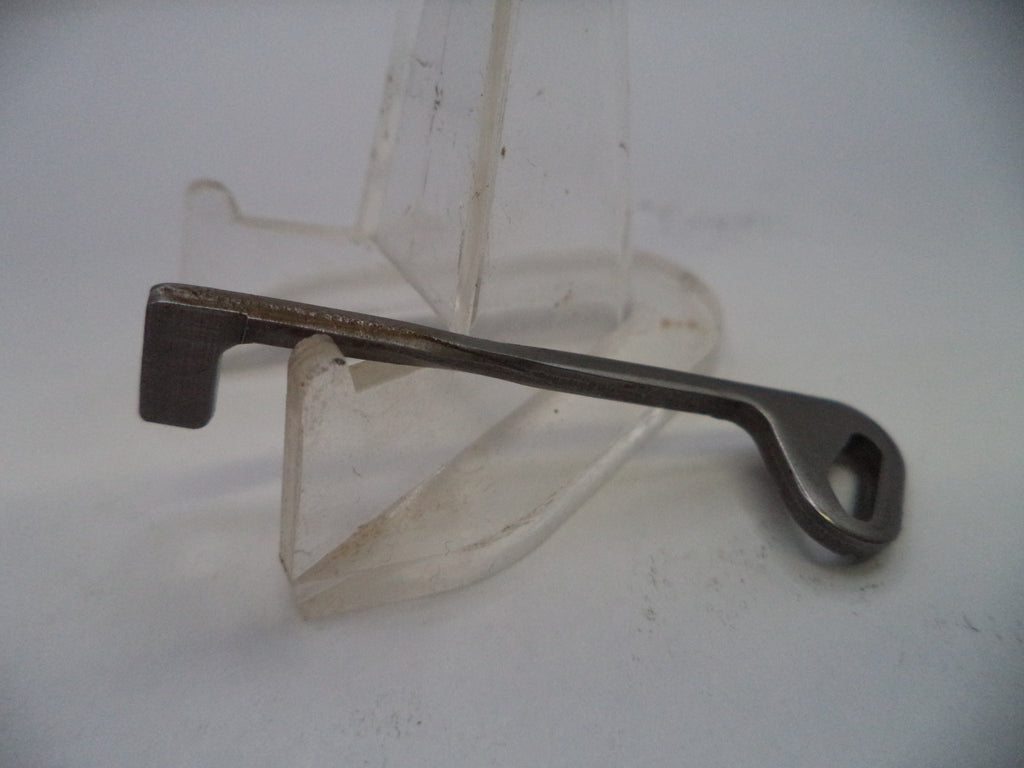 Metal tool on a stand against a white background