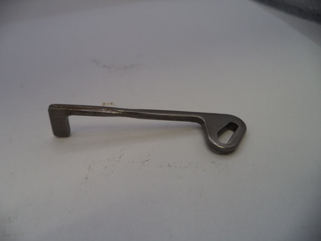 Metal key on a white surface