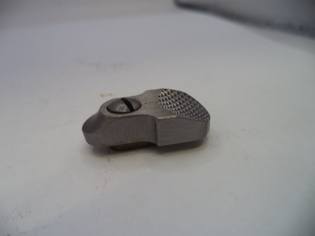 Metal component on a white surface