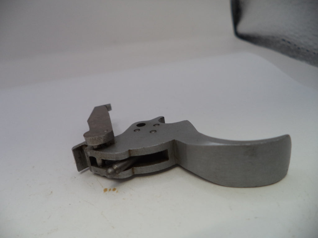 Metal tool or component on a white background