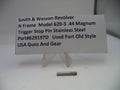 Smith & Wesson revolver part with descriptive card on a white background