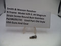 Strain screw with a label detailing specifications on a white background