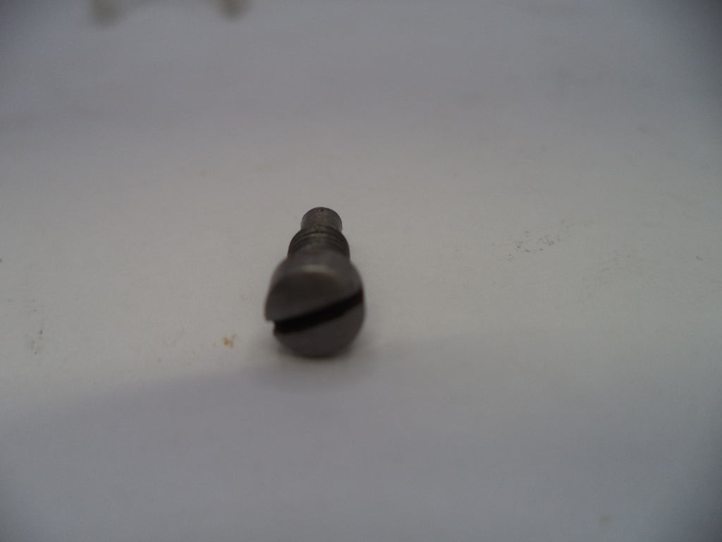 Metallic object on a white surface