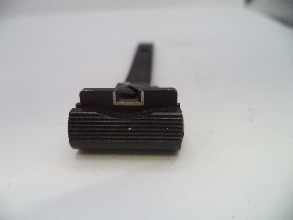 Black cylindrical object on a white background