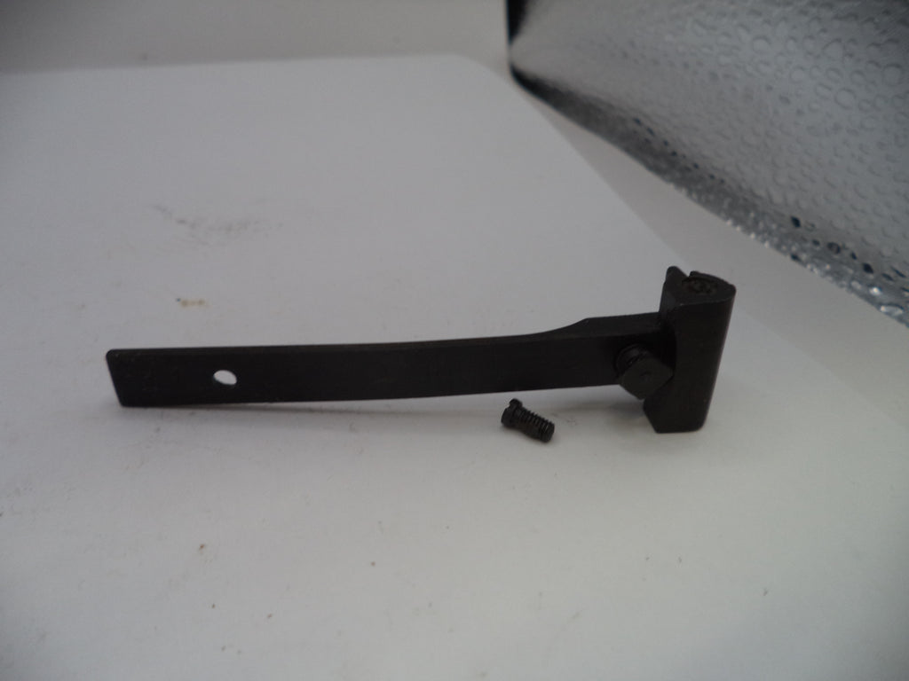 Black metal bracket on a white surface
