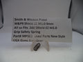 Grip safety spring for Smith & Wesson pistol on a white card with product details.