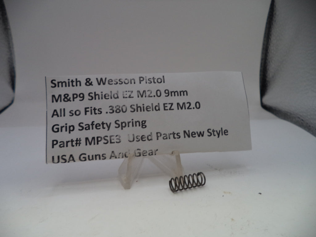 Grip safety spring for Smith & Wesson pistol on a white background with product label.