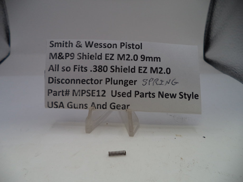 Disconnector plunger spring for Smith & Wesson pistol on a white background with descriptive text card.