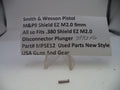 Spring for Smith & Wesson pistol on a card with product details
