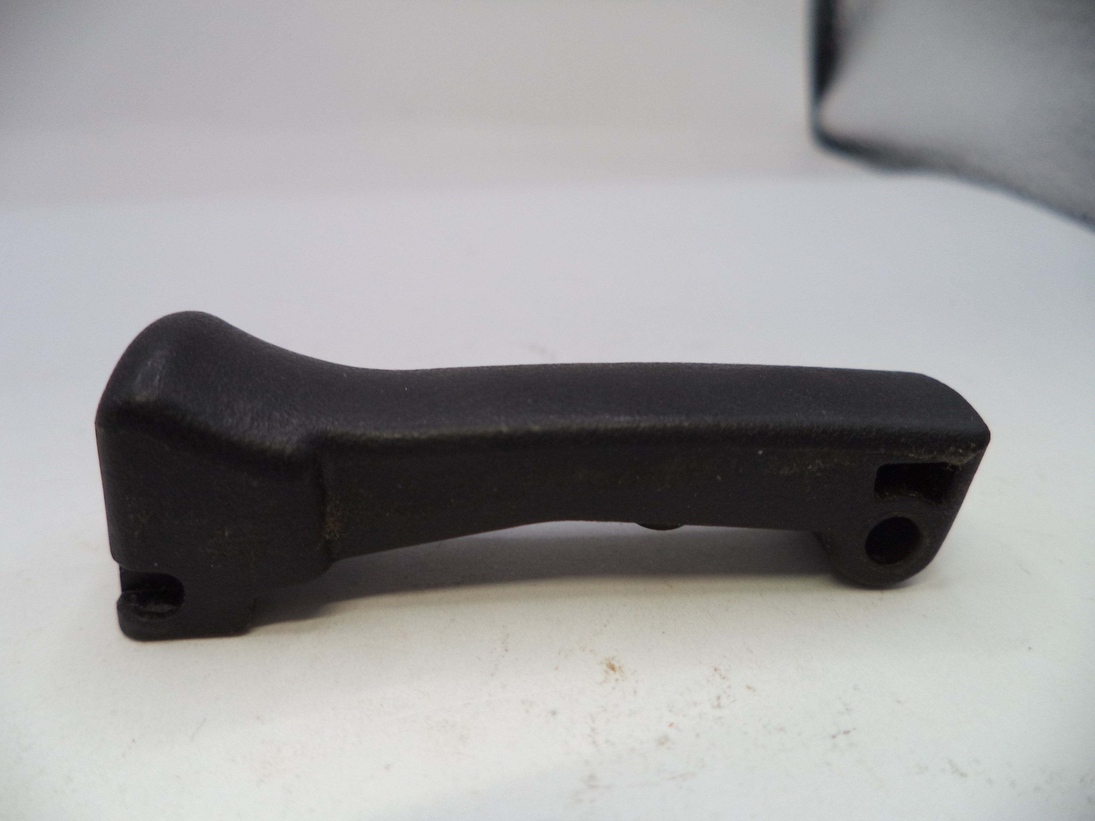 Black plastic handle on a white background
