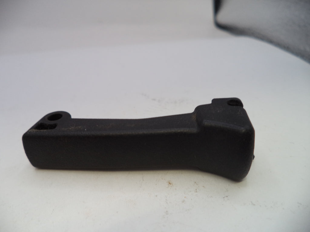 Black plastic component on a white background