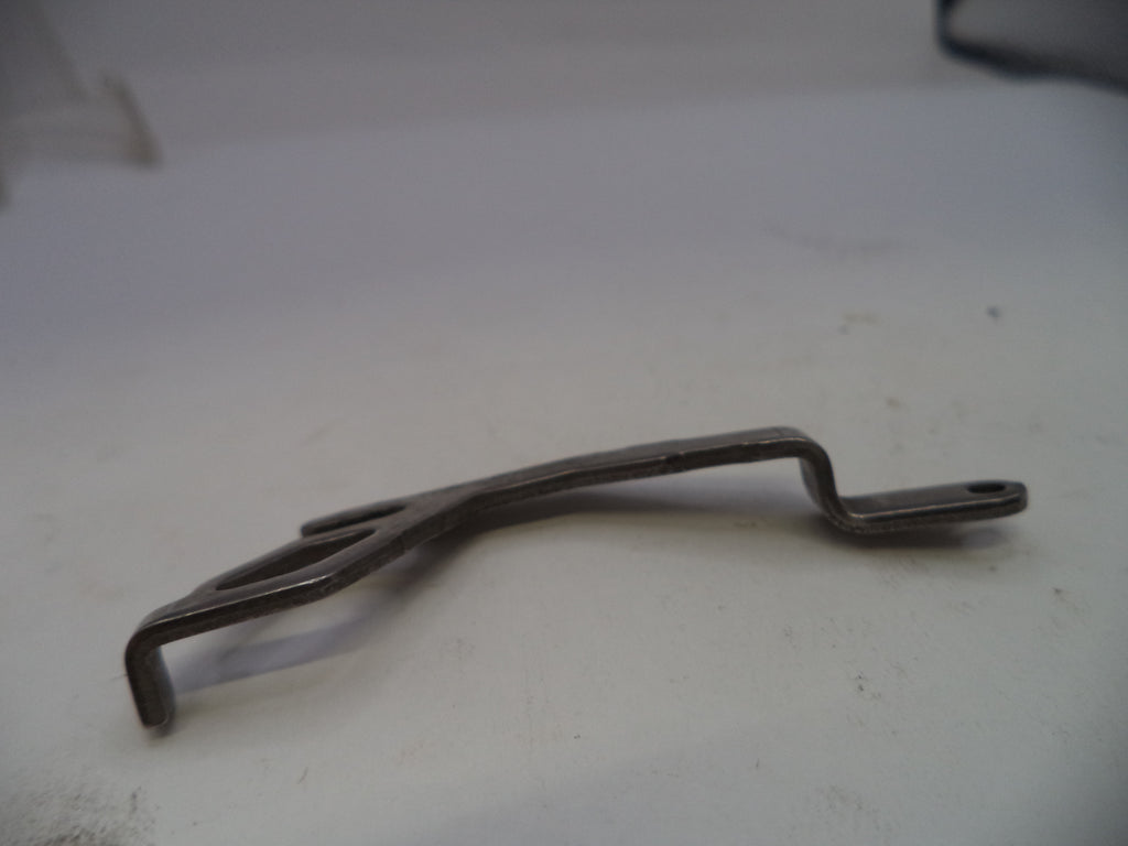 Metallic tool on a white surface