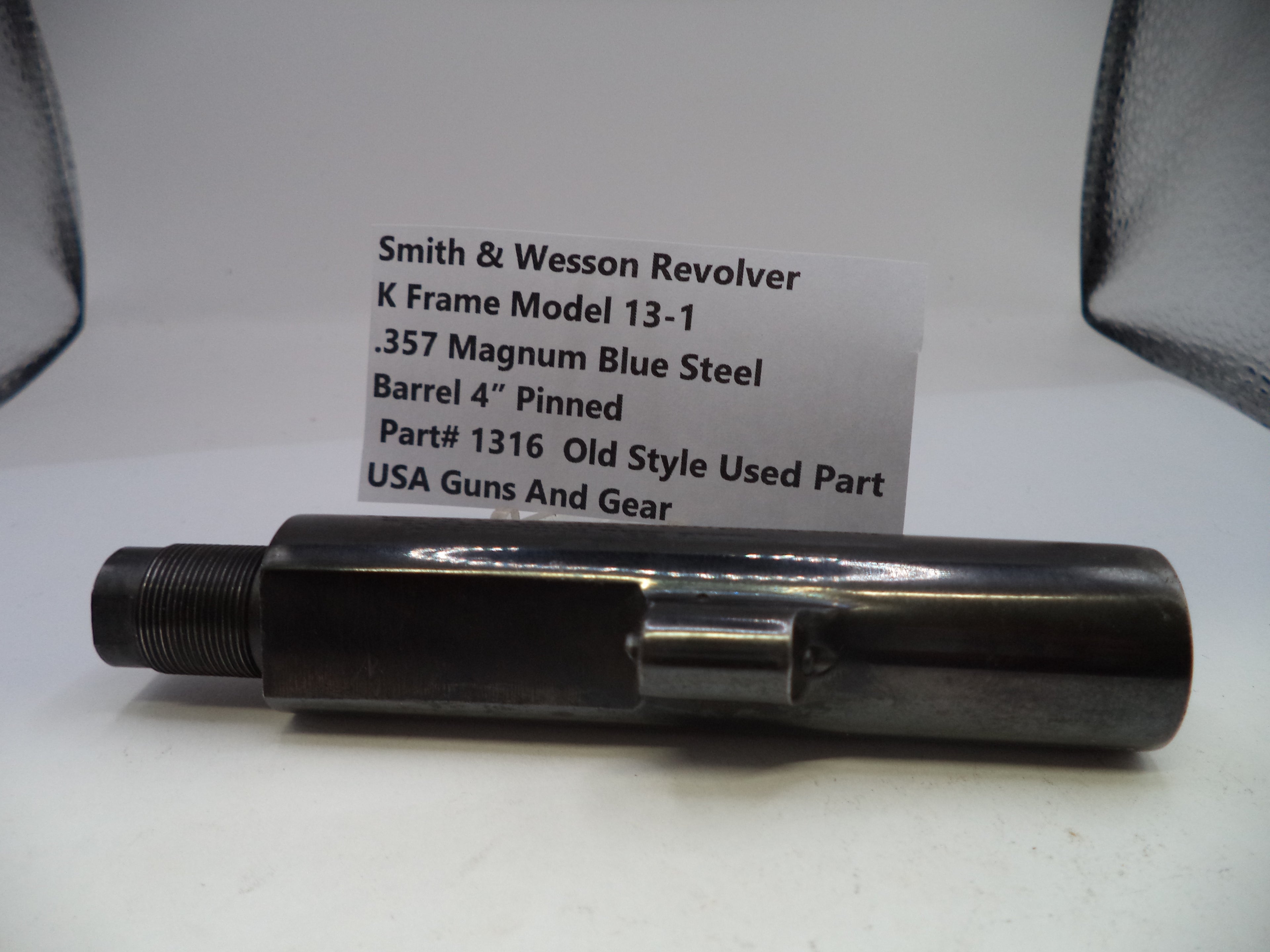Smith & Wesson revolver barrel on a white background with product label