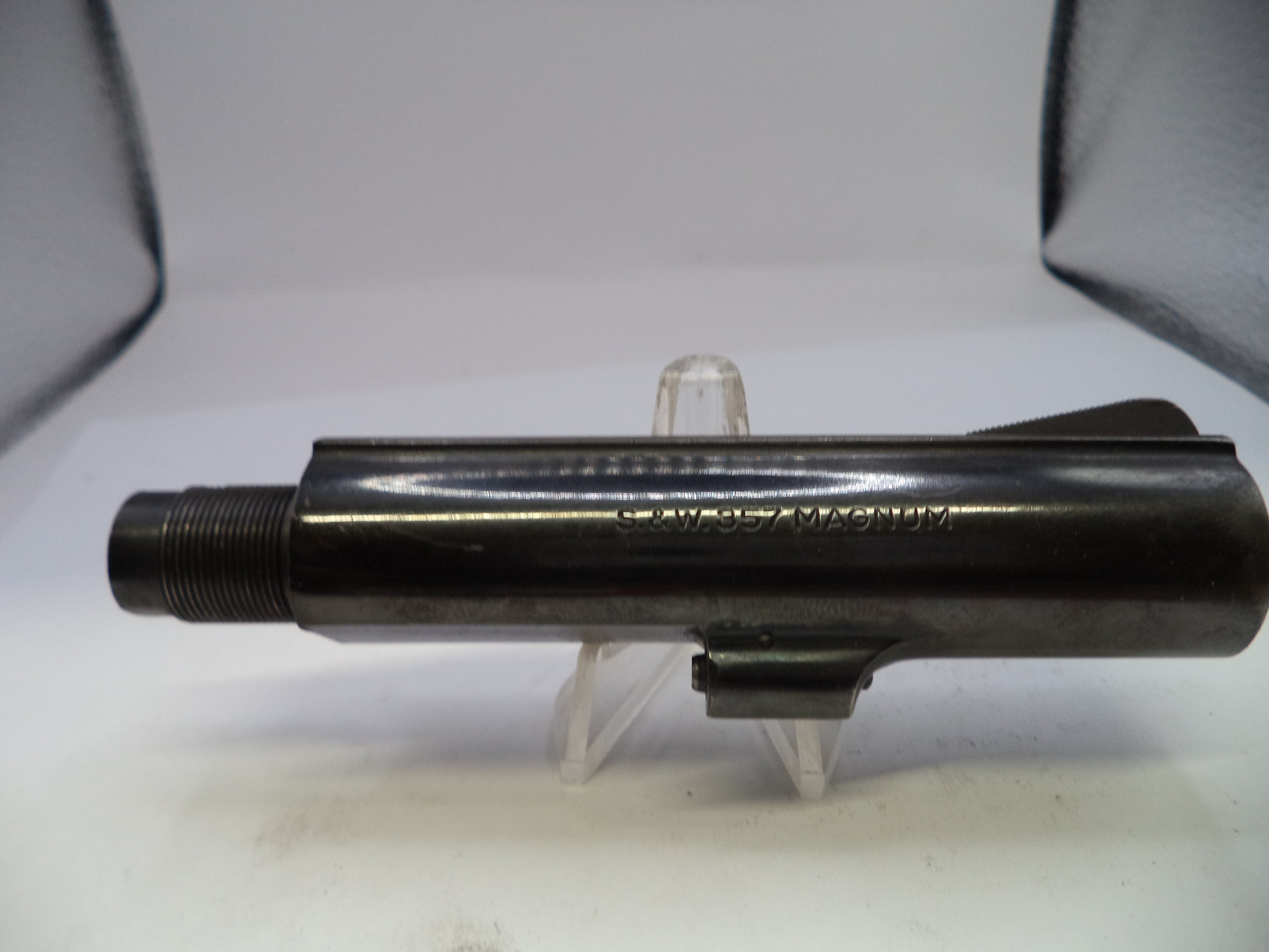 Black metal object on a stand with 'SILVER CREST' branding against a white background