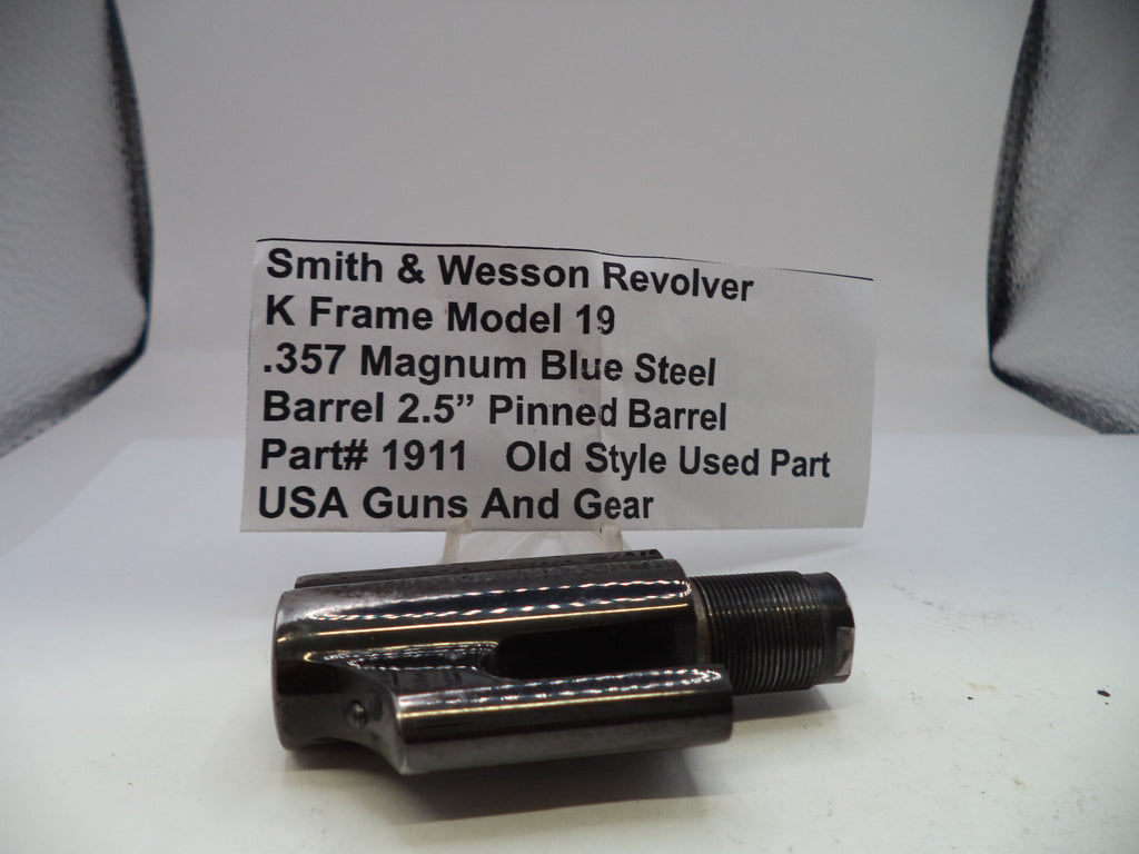 Smith & Wesson revolver barrel part with descriptive label on a white background