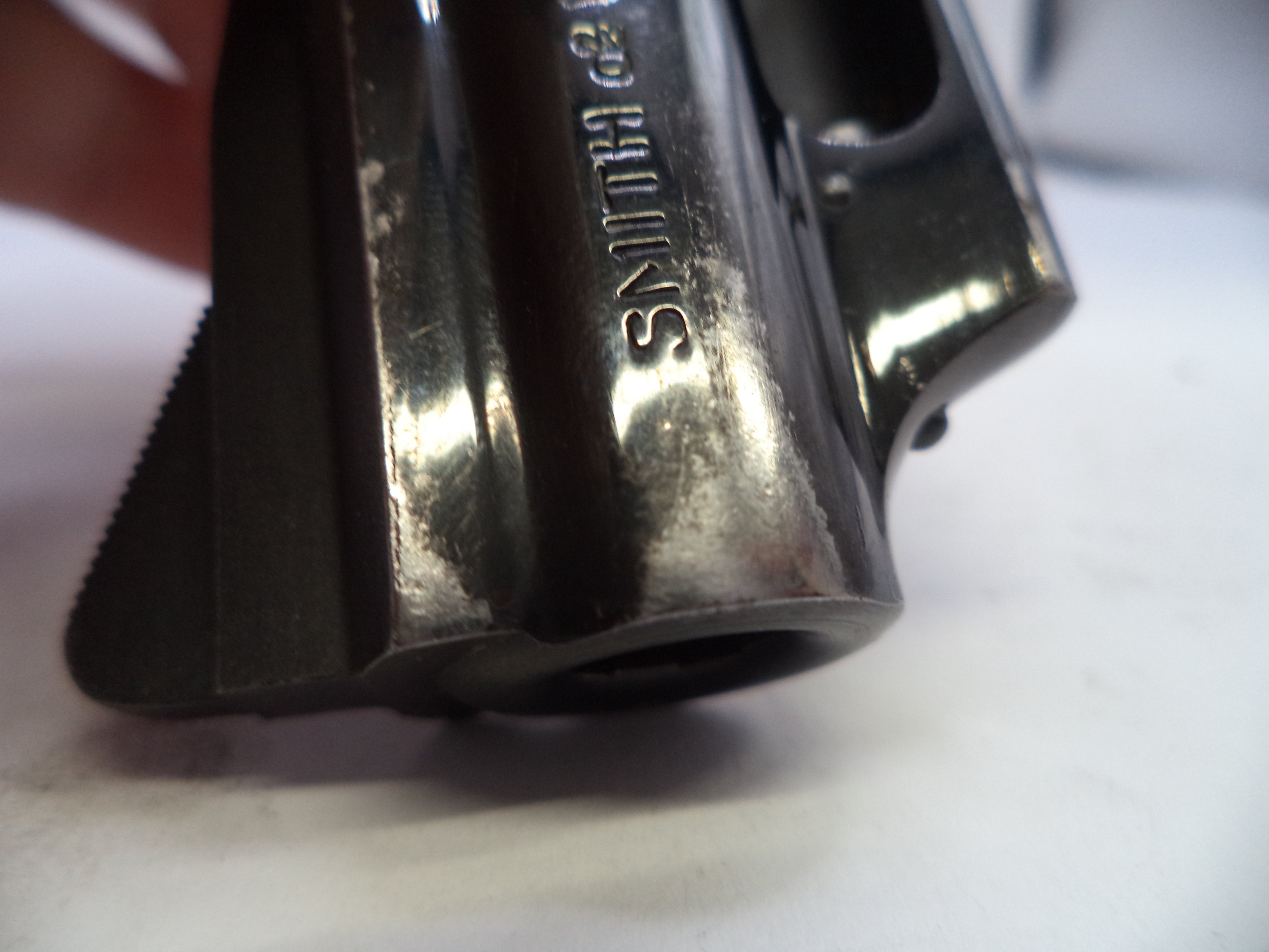 Close-up of a Smith & Wesson revolver on a white background