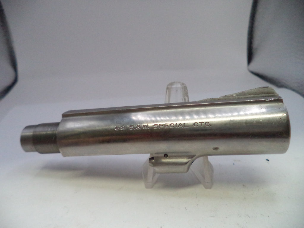 Metal cylindrical object on a stand with 'Special C.T.C.' text against a white background