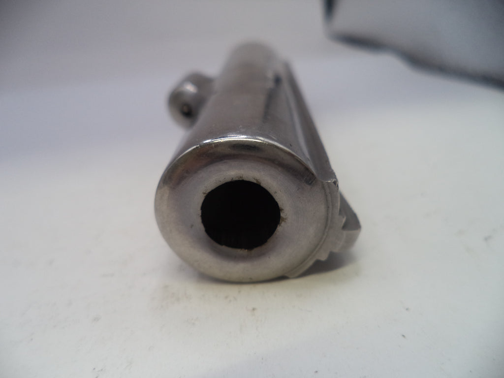Close-up of a metallic exhaust pipe on a white background