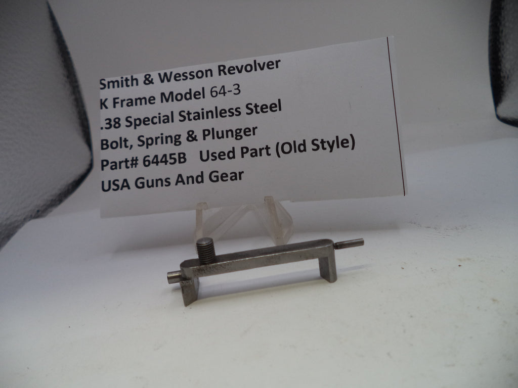 Smith & Wesson revolver part with descriptive card on a white background