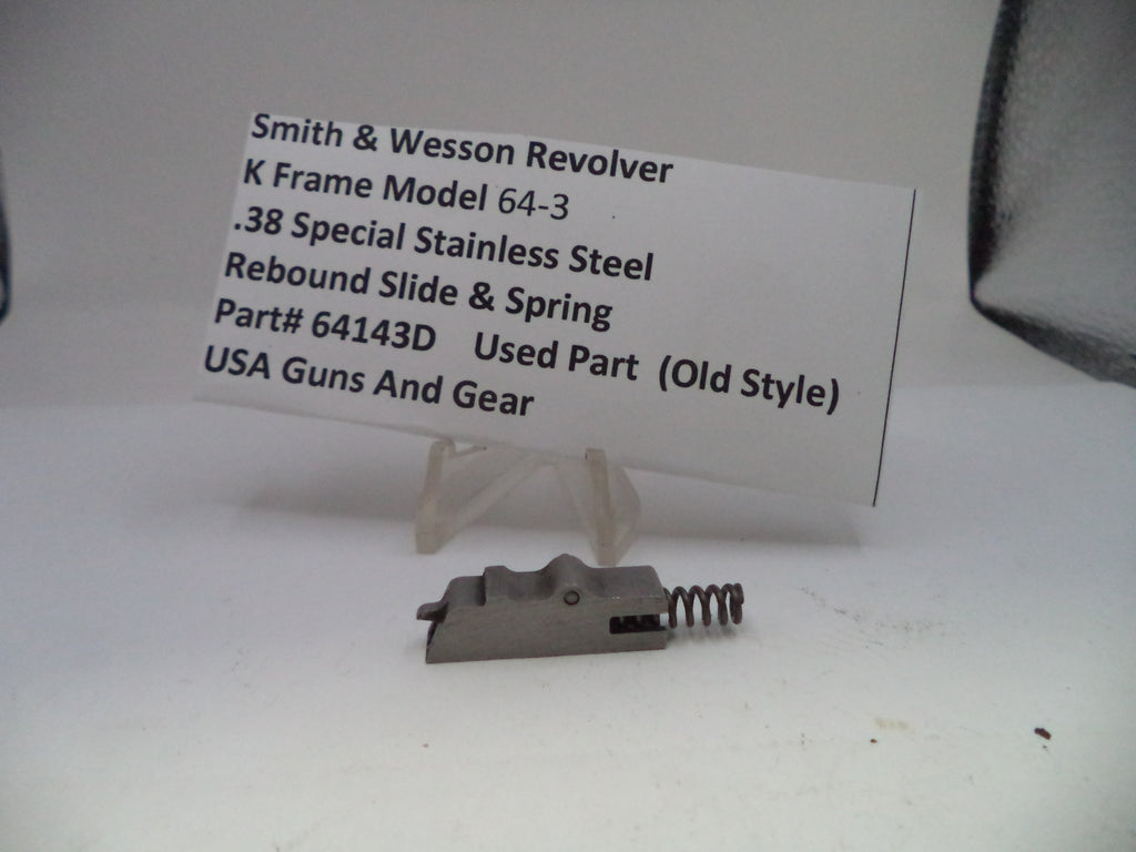 Smith & Wesson revolver part with a label on a white background