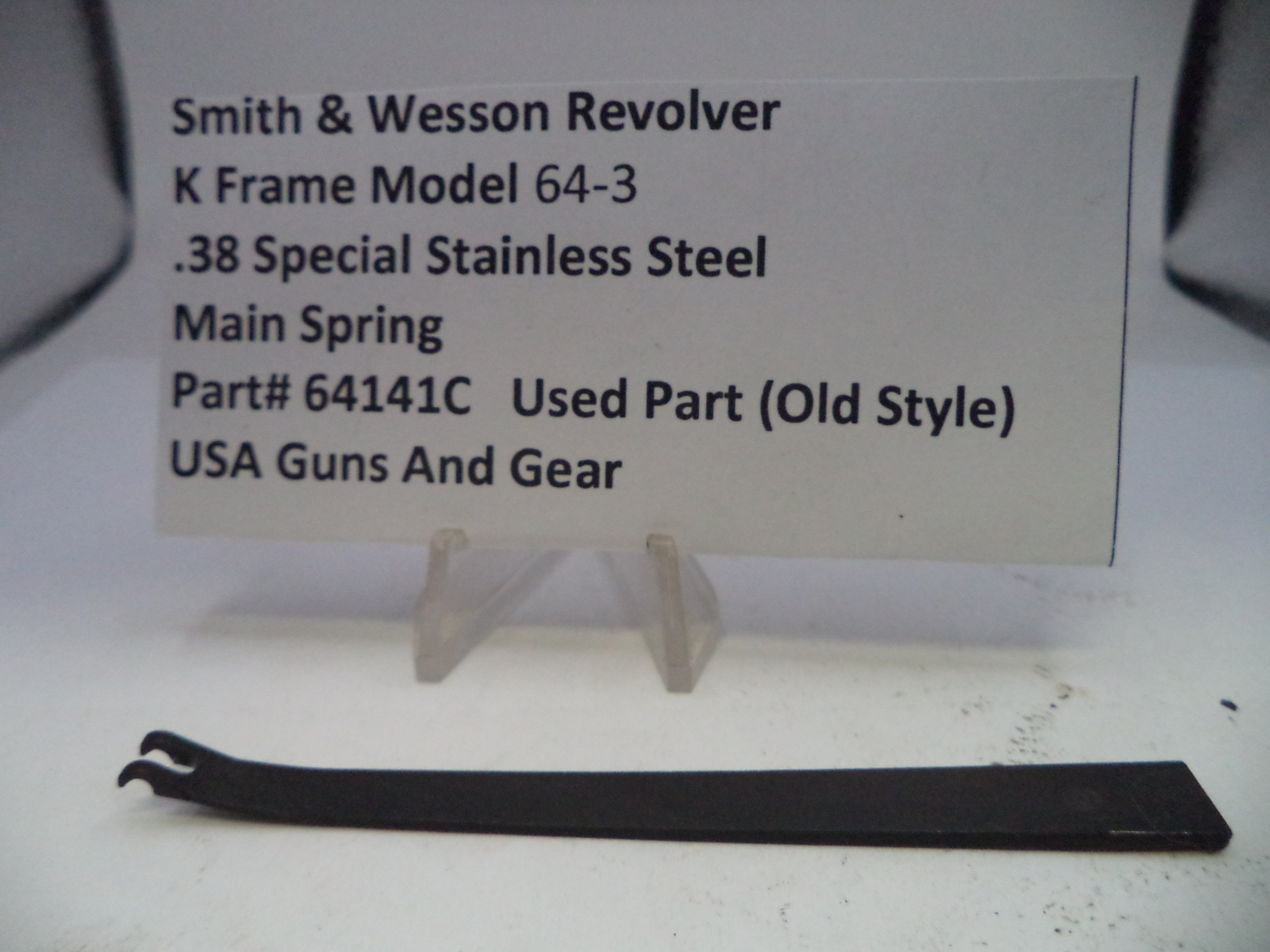 Black main spring for Smith & Wesson Revolver K Frame Model 64-3 on a white background with descriptive text.