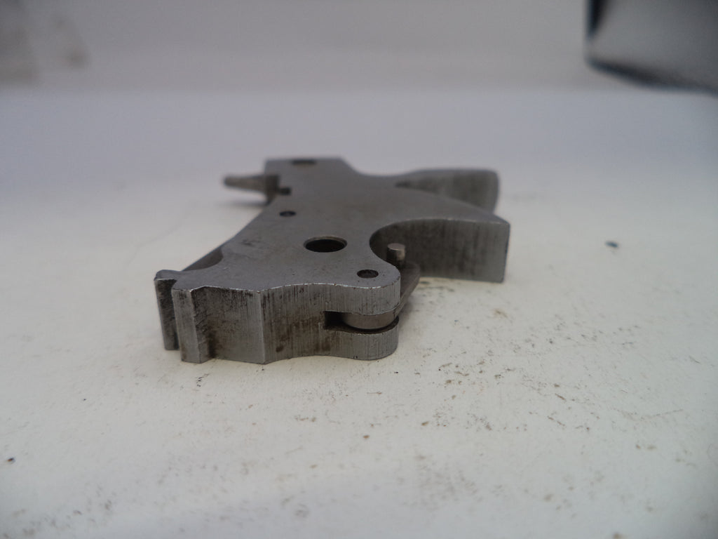 Metal mechanical component on a white surface
