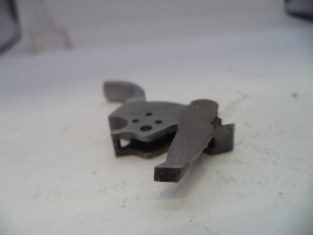 Metallic object on a white surface