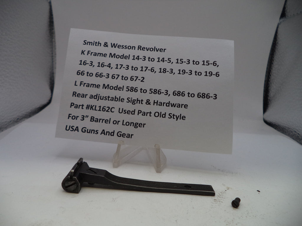 Smith & Wesson revolver part with a label on a white background