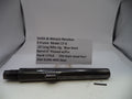 Smith & Wesson revolver barrel with descriptive card on a white background