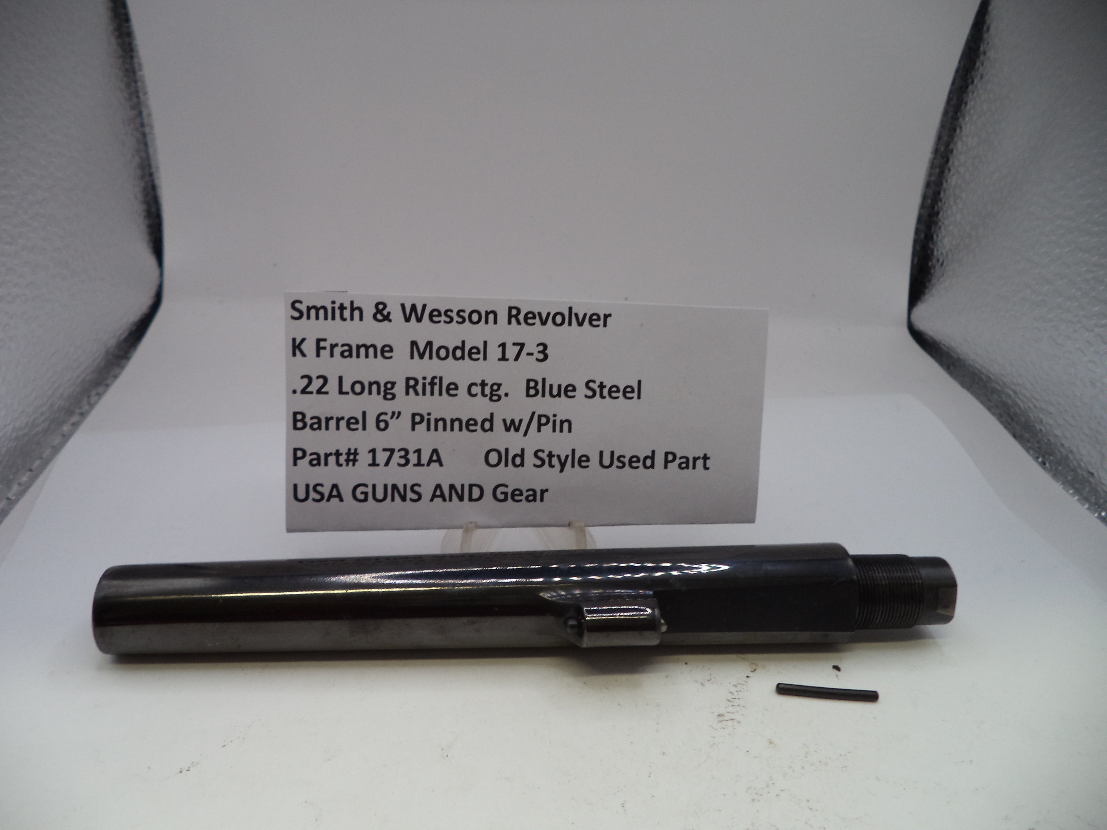 Smith & Wesson revolver barrel with descriptive label on a white background