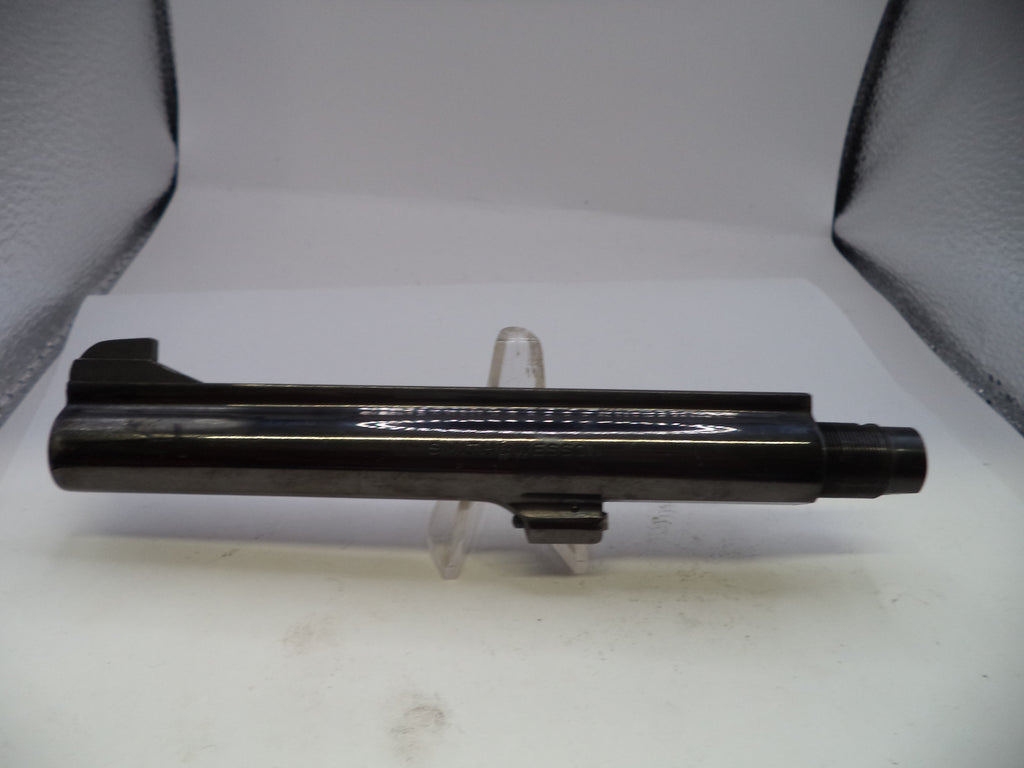 Black metal rod on a white stand against a light gray background