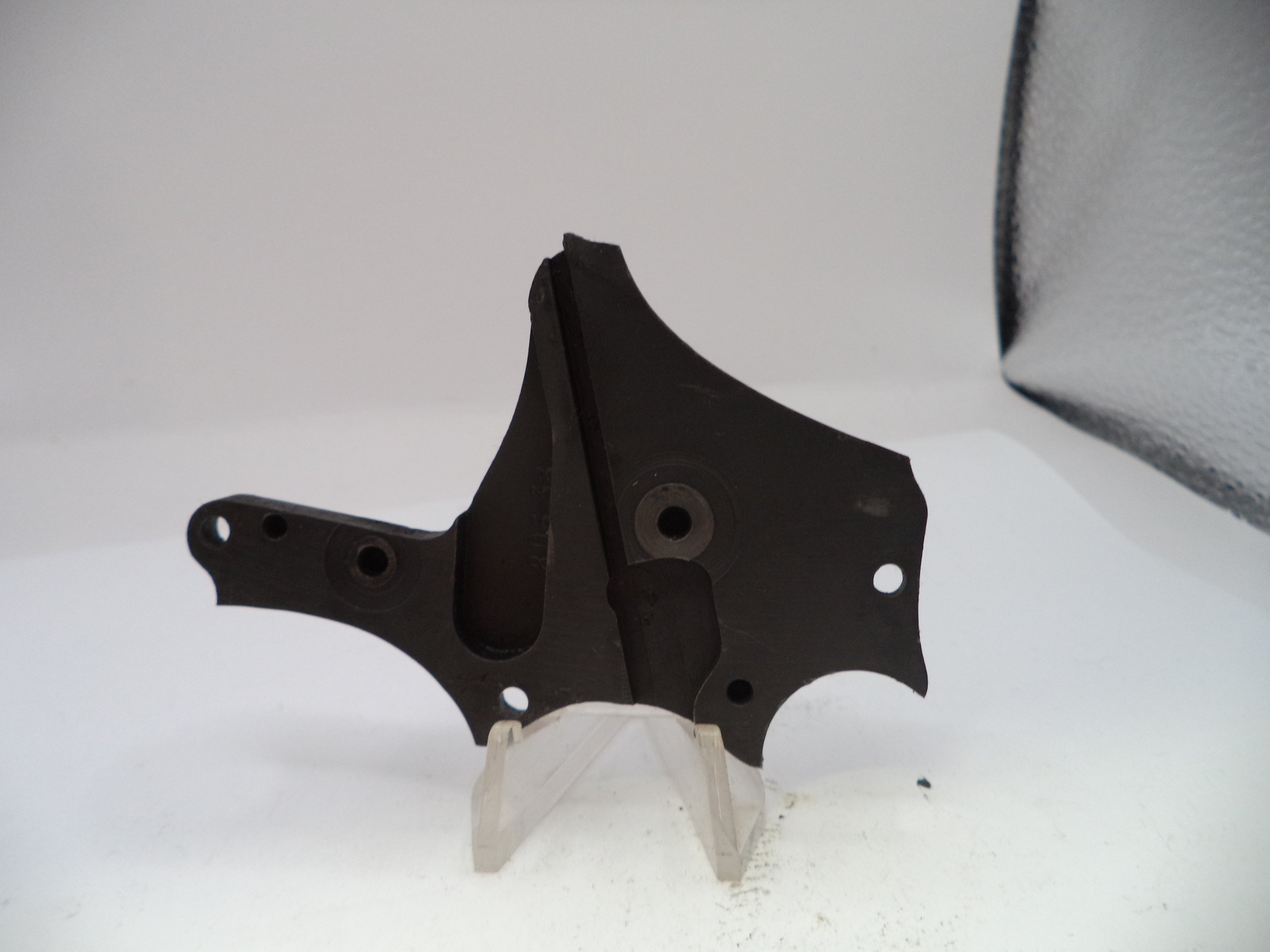 Black metal bracket on a white background
