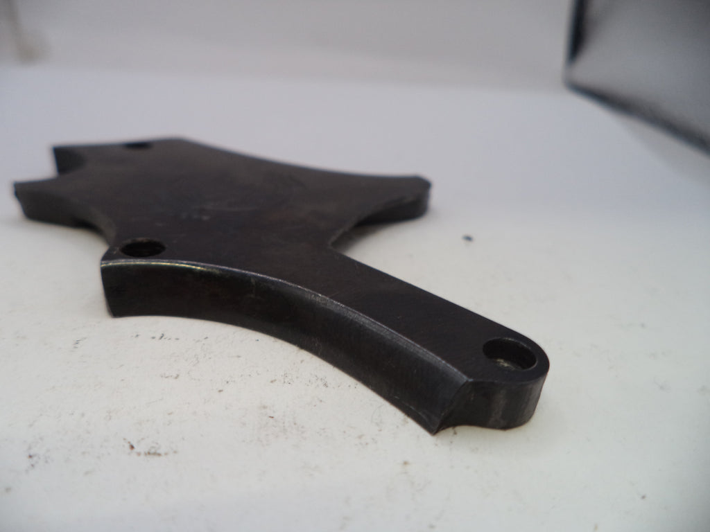 Black metal bracket on a white surface