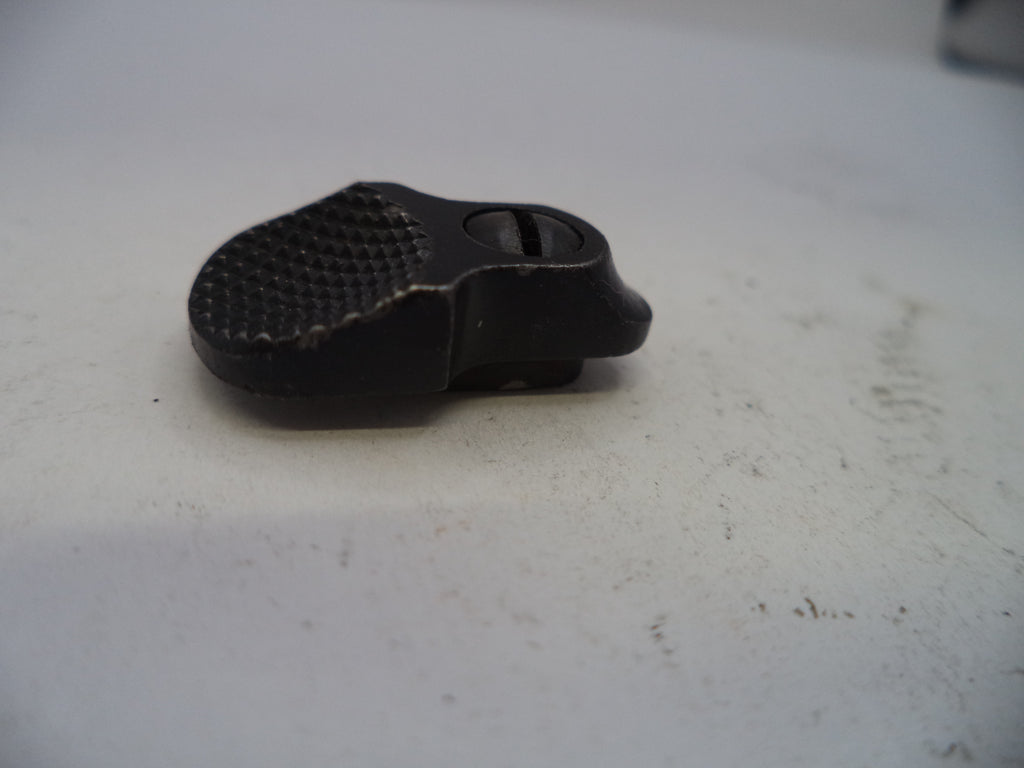 Black metal component on a white surface