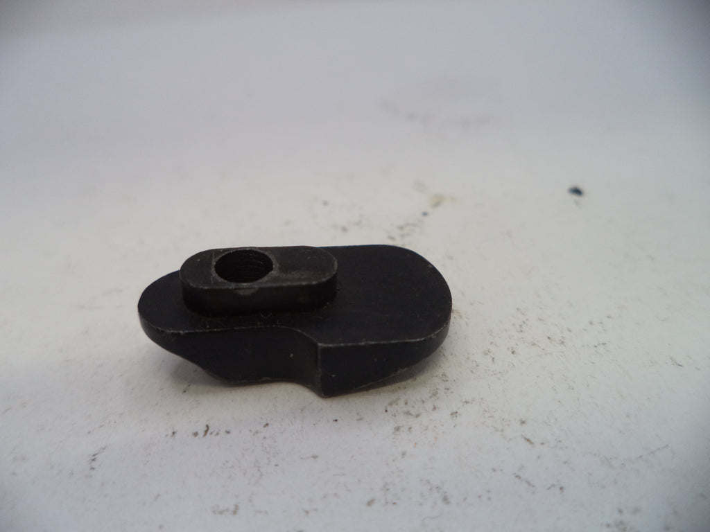 Black mechanical component on a white background