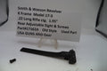 Smith & Wesson revolver part with descriptive card on a white background