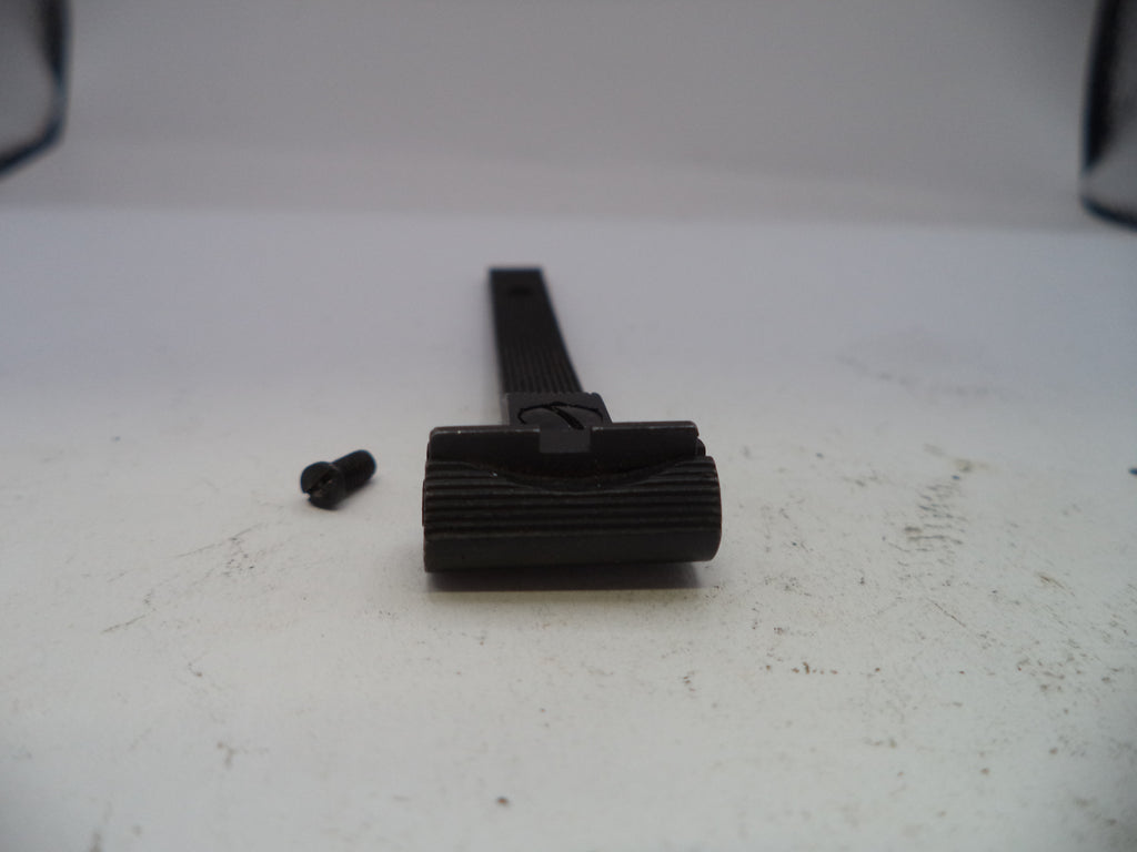 Black belt with a buckle on a white surface