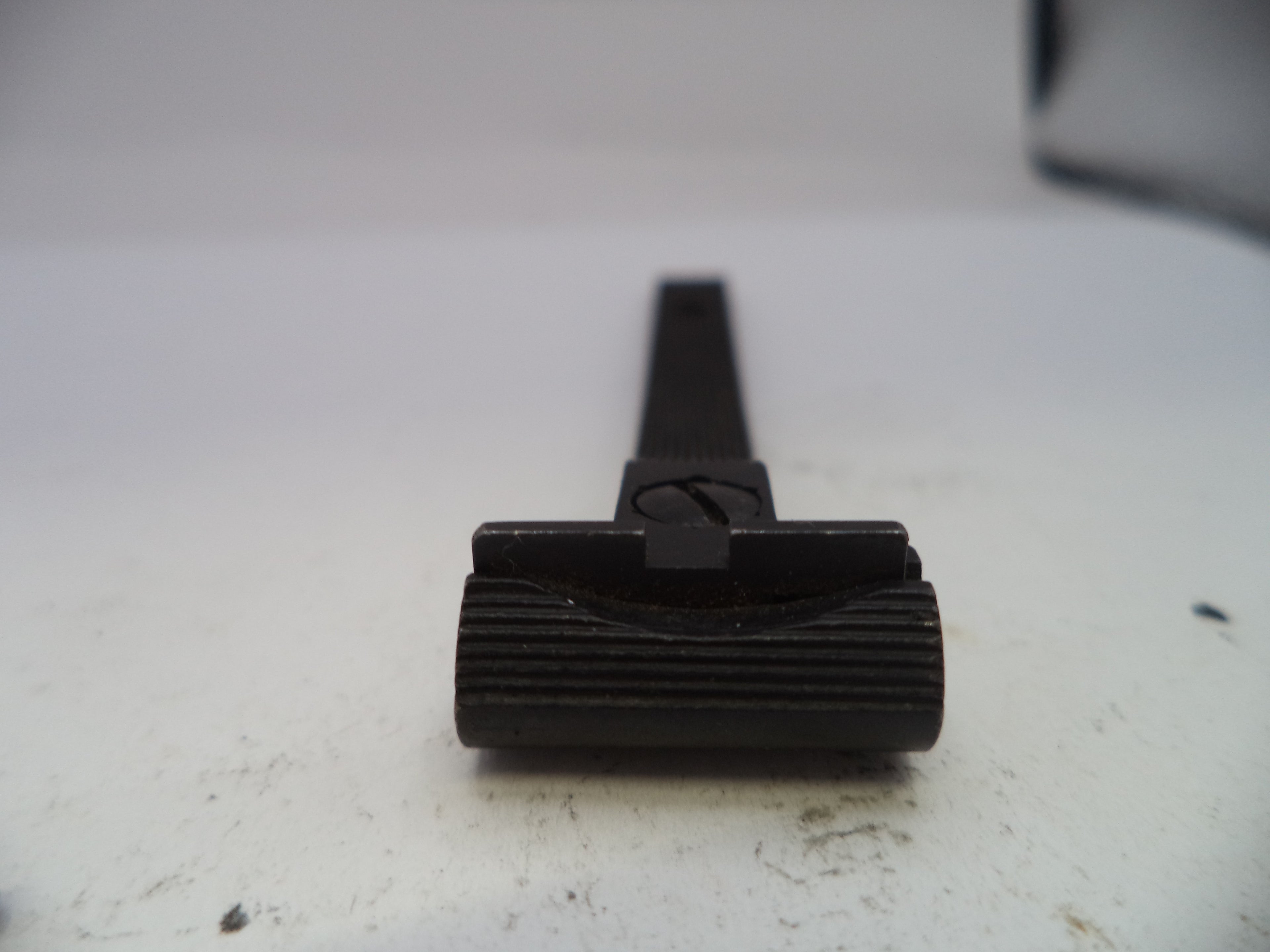 Black rubber brush on a white surface