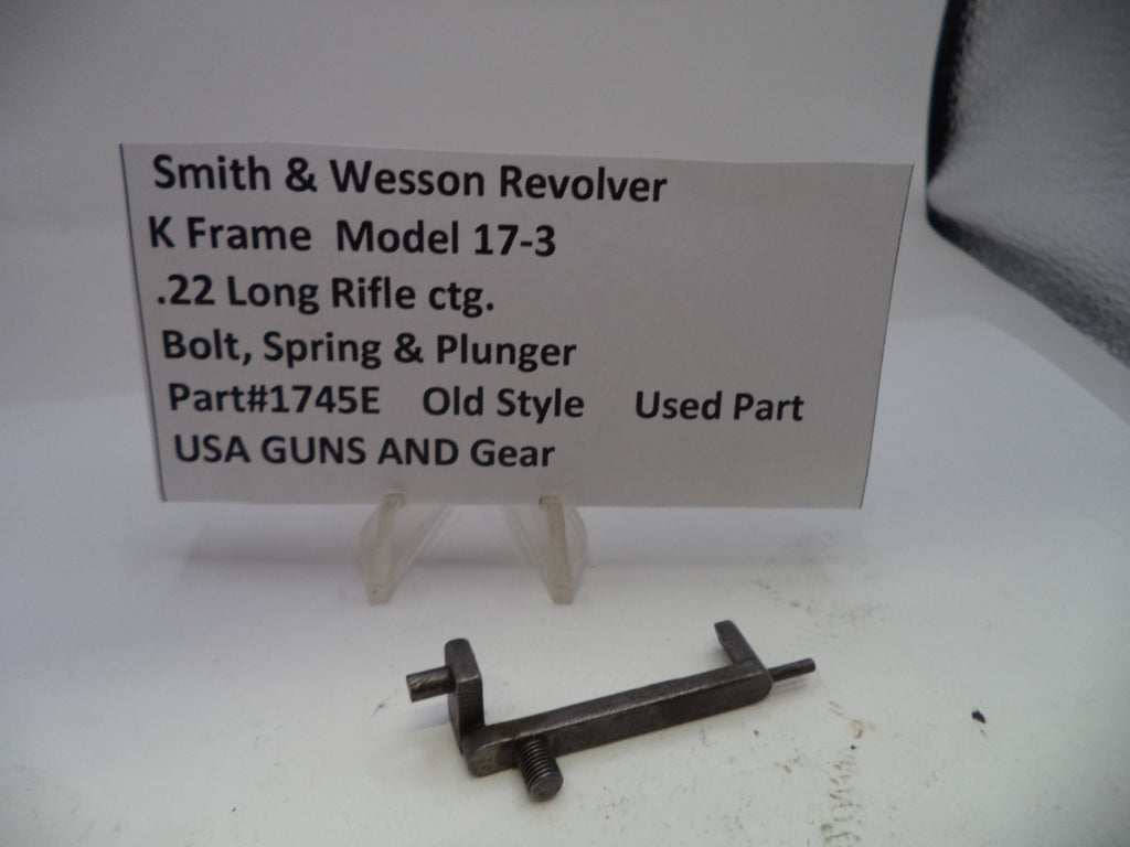Smith & Wesson revolver part on a white background with descriptive card.