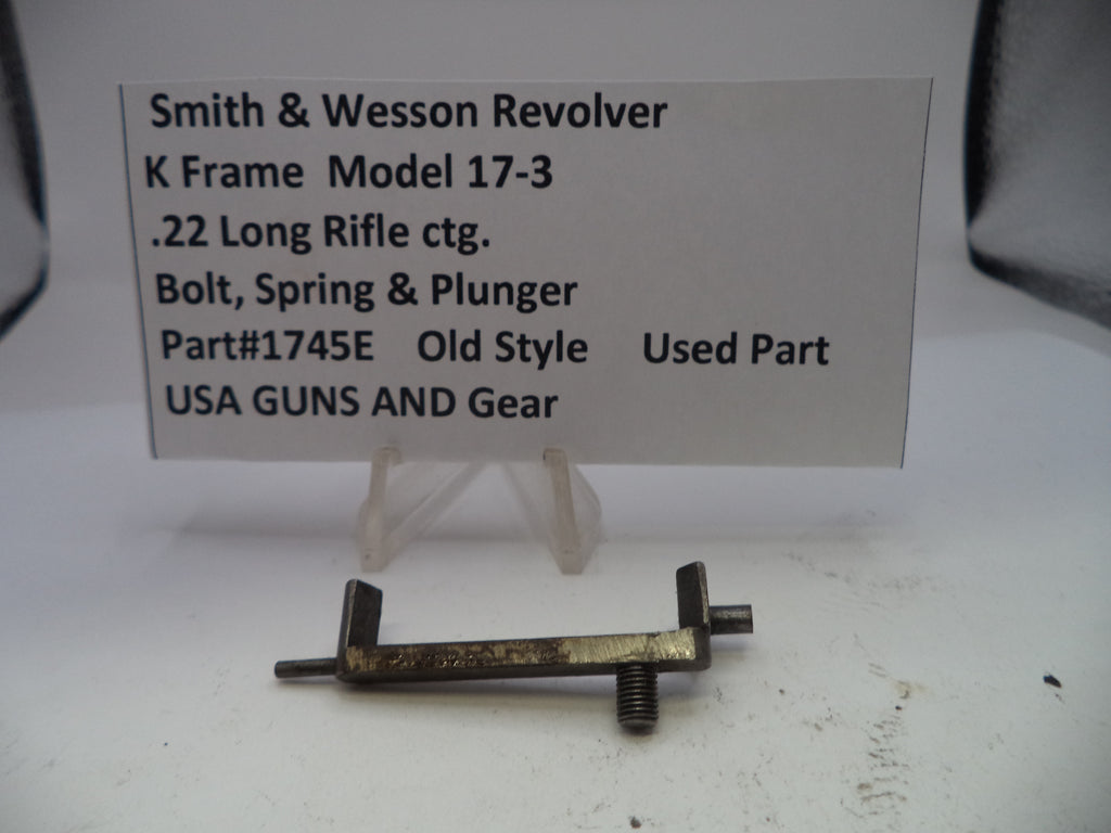 Smith & Wesson revolver part on a white background with descriptive text card.