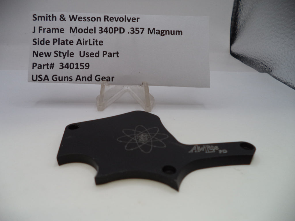 Black side plate for a Smith & Wesson revolver on a white background with product details.