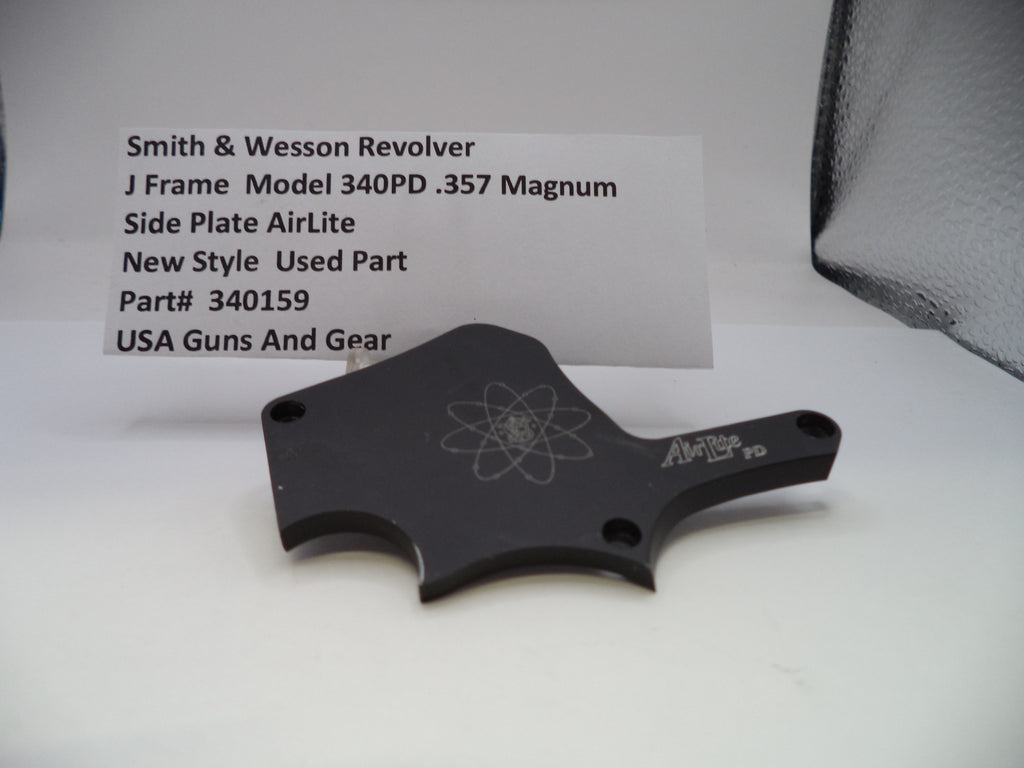 Black side plate for a Smith & Wesson revolver on a white background with text.